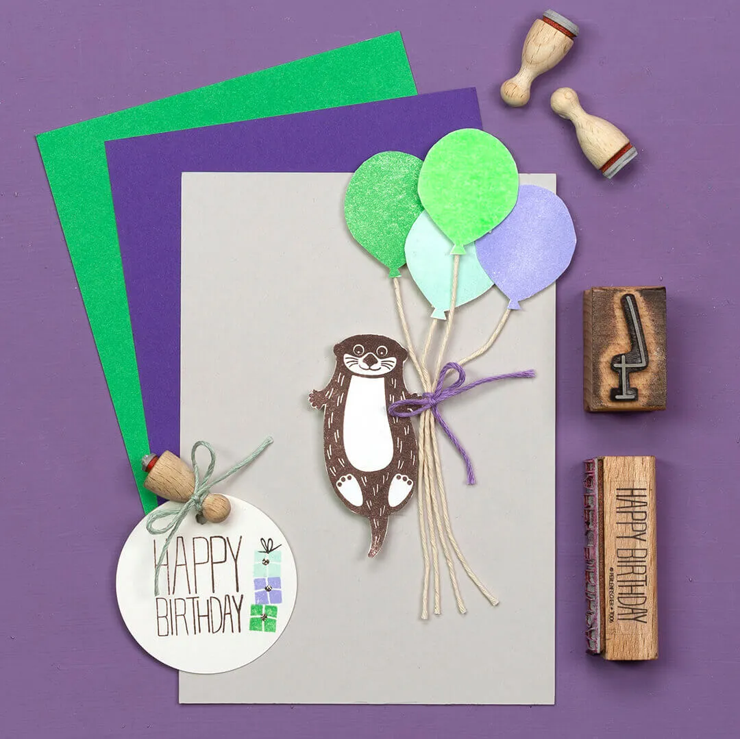Perlenfischer Otter Stempel 32x62 mm Holz